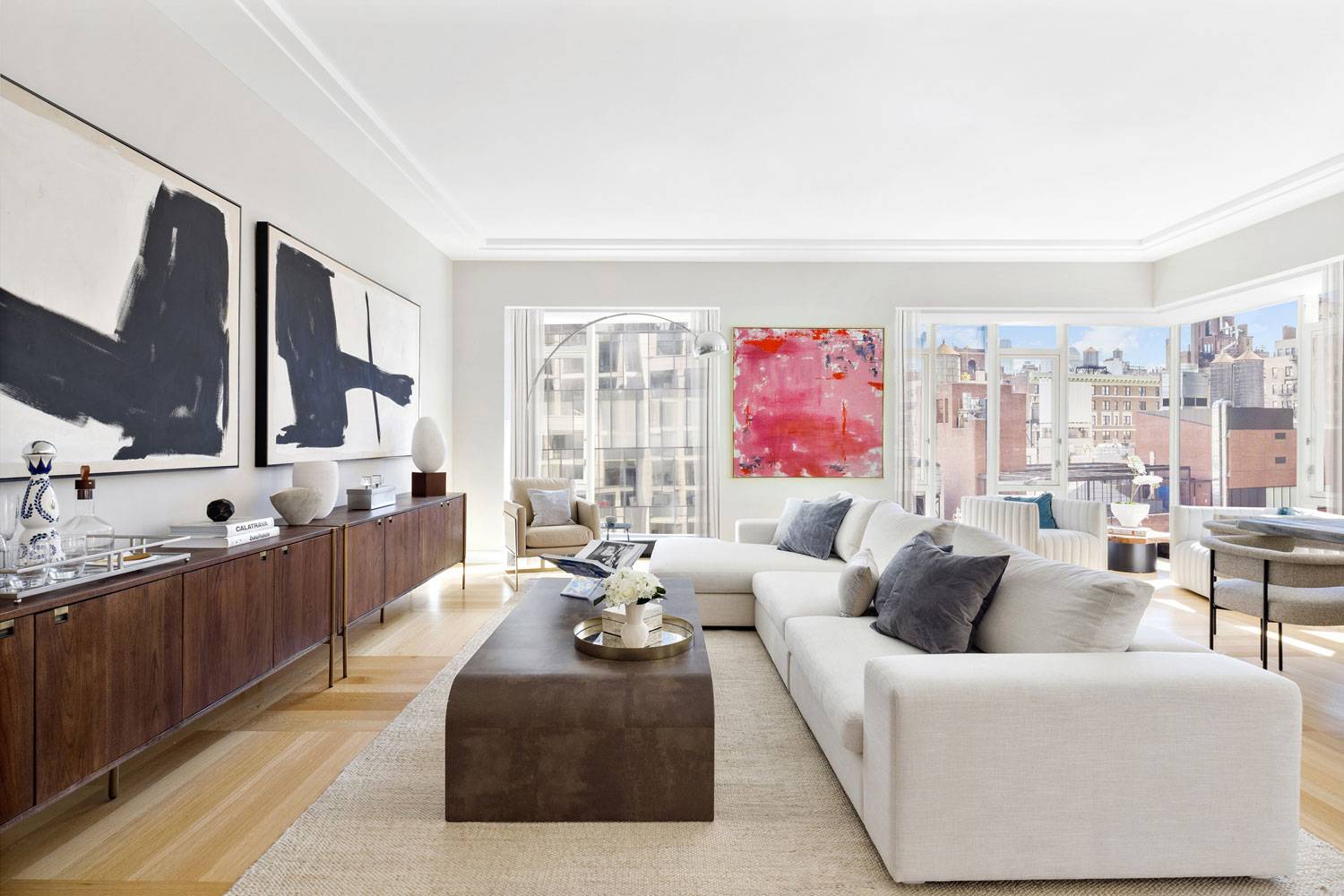 1289 Lexington large living room and dining room with floor-to-ceiling windows wrapping around the corner